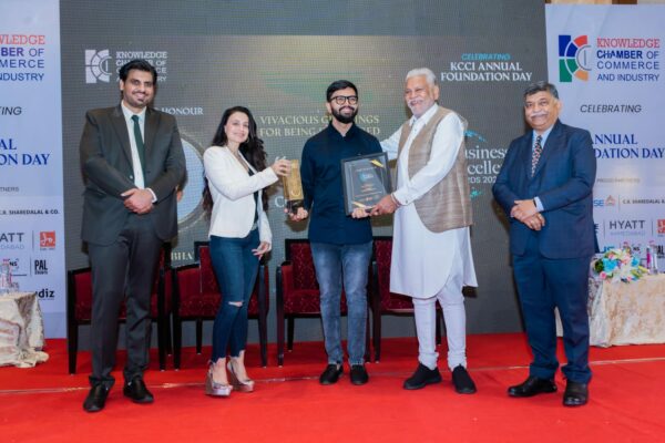 Mr. Bhaumik Bhatt Receives Prestigious Award from Cabinet Minister Purushottam Rupala and Actress Amisha Patel